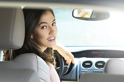 image of teenage girl learning to drive